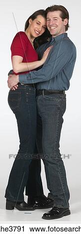 Couple laughing and hugging View Large Photo Image Stock Image - Couple laughing and hugging . Fotosearch