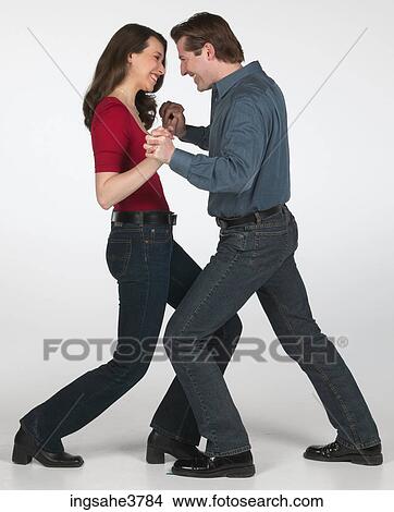 Picture - Couple smiling and dancing . Fotosearch