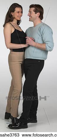 Couple smiling and dancing View Large Photo Image Stock Image - Couple smiling and dancing . Fotosearch