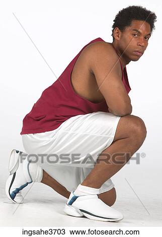 Crouching athlete View Large Photo Image Stock Image - Crouching athlete . Fotosearch
