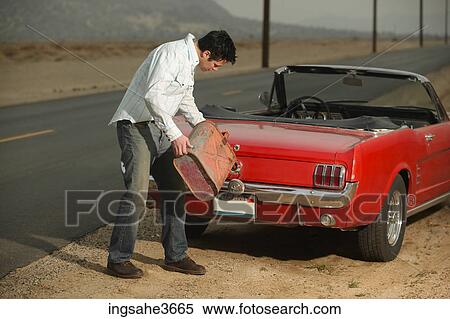 Filing up car with gas View Large Photo Image Stock Photography - Filing up car with gas . Fotosearch