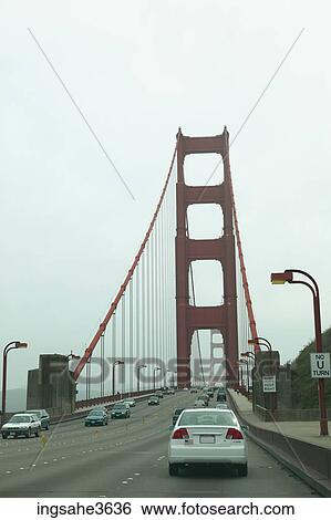 Golden Gate Bridge and cars View Large Photo Image Stock Photograph - Golden Gate Bridge and cars . Fotosearch