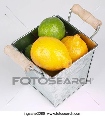 Lemons in basket View Large Photo Image Stock Photography - Lemons in basket . Fotosearch