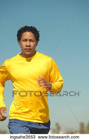Stock Image - Man running . Fotosearch