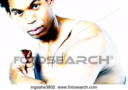 Man showing off muscles View Large Photo Image Stock Image - Man showing off muscles . Fotosearch