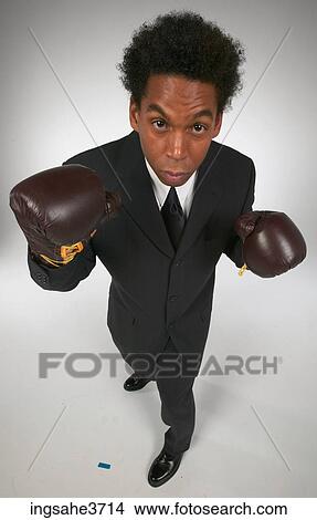 Man standing in a boxing stance View Large Photo Image Picture - Man standing in a boxing stance . Fotosearch