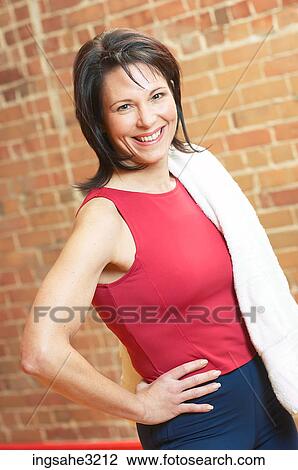Mature adult woman smiling with towel View Large Photo Image Stock Image - Mature adult woman smiling with towel . Fotosearch