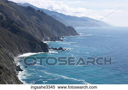 Stock Photography - Mountainous rocky coastline . Fotosearch