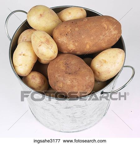Stock Photo - potatoes in basket . Fotosearch