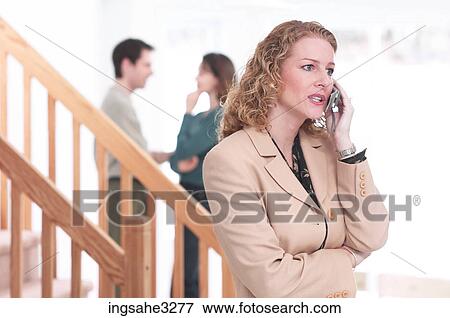 real estate agent on cell phone View Large Photo Image Stock Photo - real estate agent on cell phone . Fotosearch