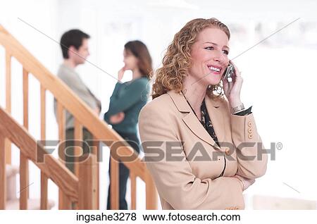 real estate agent on cell phone View Large Photo Image Stock Photo - real estate agent on cell phone . Fotosearch