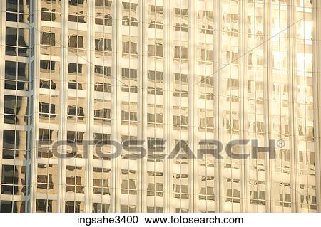 Reflection of building in windows View Large Photo Image Stock Image - Reflection of building in windows . Fotosearch