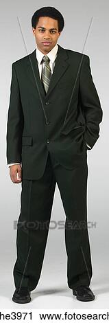 Serious businessman in black suit View Large Photo Image Stock Image - Serious businessman in black suit . Fotosearch