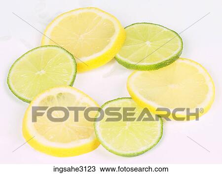slices of lime and lemon View Large Photo Image Stock Image - slices of lime and lemon . Fotosearch