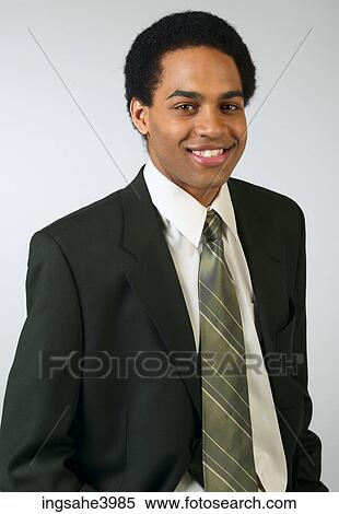 Smiling businessman in suit View Large Photo Image Stock Photography - Smiling businessman in suit. Fotosearch
