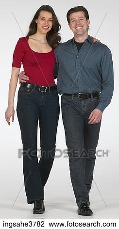 Smiling couple walking View Large Photo Image Stock Image - Smiling couple walking . Fotosearch