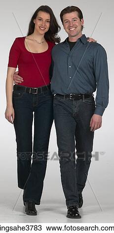 Smiling couple walking View Large Photo Image Stock Image - Smiling couple walking . Fotosearch