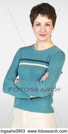 Smiling woman in blue sweater View Large Photo Image Stock Image - Smiling woman in blue sweater. Fotosearch