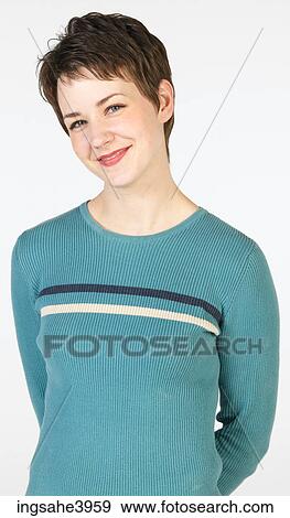 Smiling woman in blue sweater View Large Photo Image Stock Photo - Smiling woman in blue sweater . Fotosearch