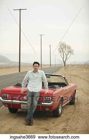 Standing next to car View Large Photo Image Stock Photo - Standing next to car . Fotosearch