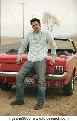 Standing next to car View Large Photo Image Stock Photograph - Standing next to car . Fotosearch