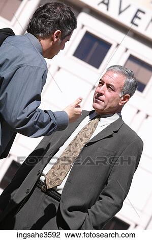 Two business men on city View Large Photo Image Stock Image - Two business men on city . Fotosearch