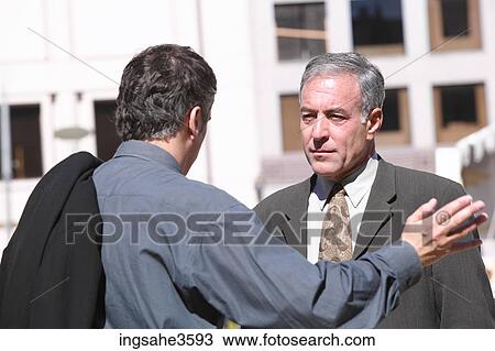 Two business men on city View Large Photo Image Stock Image - Two business men on city . Fotosearch