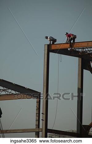 Two construction workers View Large Photo Image Stock Photography - Two construction workers . Fotosearch