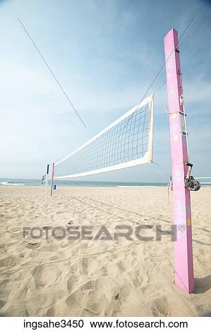 Volleyball net on deserted beach View Large Photo Image Stock Image - Volleyball net on deserted beach . Fotosearch