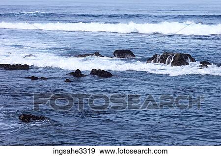 waves on rocky coast View Large Photo Image Stock Photo - waves on rocky coast . Fotosearch