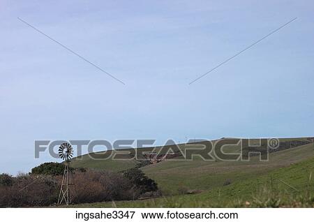 Windmill and hill View Large Photo Image Stock Photo - Windmill and hill . Fotosearch