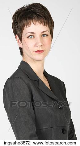 Woman with light eyes and short brown hair gazing ahead View Large Photo Image Stock Image - Woman with light eyes and short brown hair gazing ahead. Fotosearch