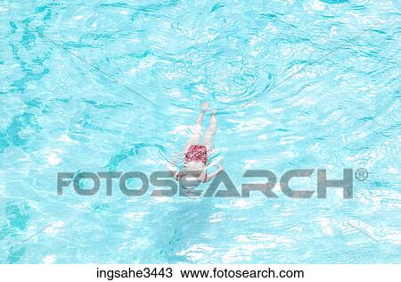 Young female adult swimming View Large Photo Image Stock Image - Young female adult swimming . Fotosearch