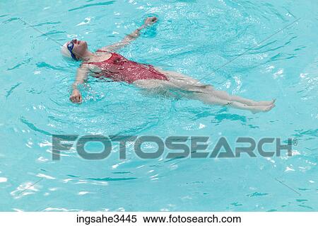 Young female adult swimming View Large Photo Image Stock Photography - Young female adult swimming . Fotosearch