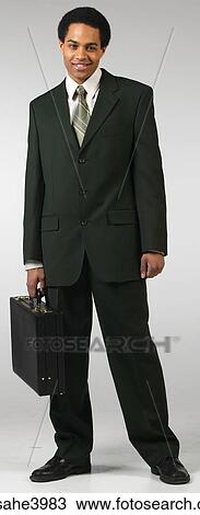Young man standing View Large Photo Image Stock Image - Young man standing. Fotosearch