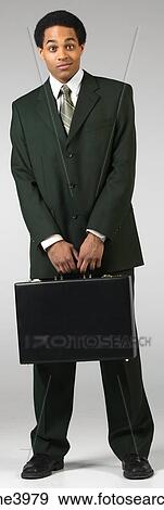 Young man standing View Large Photo Image Stock Photo - Young man standing. Fotosearch