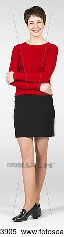 Young woman smiling and posing View Large Photo Image Stock Photography - Young woman smiling and posing. Fotosearch