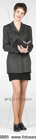 Young woman standing View Large Photo Image Stock Photography - Young woman standing. Fotosearch