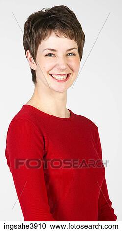 Young woman with short hair and light eyes View Large Photo Image Stock Image - Young woman with short hair and light eyes. Fotosearch