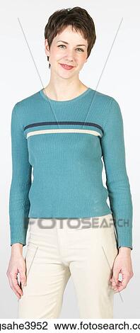 Stock Image - Young woman with short hair and light eyes. Fotosearch