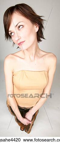 Stock Image - Annoyed woman rolling her eyes. Fotosearch