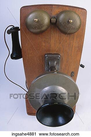 Stock Image - Antique wall phone . Fotosearch