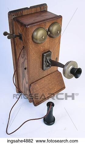 Stock Image - Antique wall phone . Fotosearch