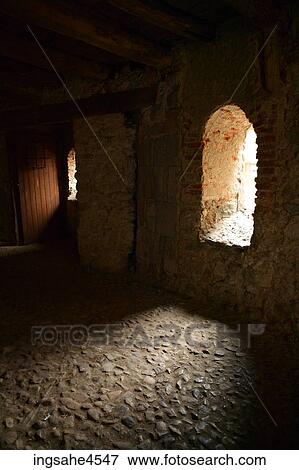 Arched window on interior of stone wall View Large Photo Image Stock Photo - Arched window on interior of stone wall . Fotosearch
