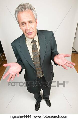 Arguing businessman in black suit View Large Photo Image Picture - Arguing businessman in black suit. Fotosearch