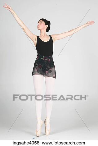 Ballerina in a ballet dance pose View Large Photo Image Stock Photograph - Ballerina in a ballet dance pose . Fotosearch