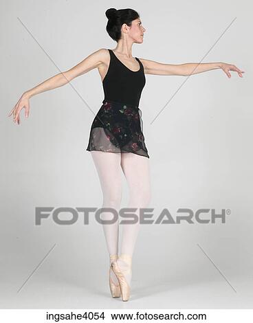 Ballerina in a ballet pose View Large Photo Image Picture - Ballerina in a ballet pose . Fotosearch
