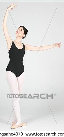 Ballerina in a ballet pose View Large Photo Image Stock Image - Ballerina in a ballet pose . Fotosearch