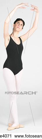 Ballerina in a ballet pose View Large Photo Image Stock Image - Ballerina in a ballet pose . Fotosearch