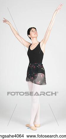 Ballerina standing in a pose View Large Photo Image Picture - Ballerina standing in a pose . Fotosearch